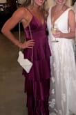 This dress is perfect!!!!!!!!!! Very flattering and classy, but still very unique. A little long but the right shoes made it work. - Amanda L.
