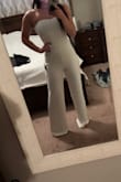 This jumpsuit fits perfectly. I bought it to wear for my engagement party or shower or some wedding event, but I love it so much I may end up wearing it for the dance portion of my wedding. - Leah J.
