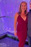 This dress is very comfortable and I got lots of compliments on it! It does do a good job of hiding the tummy. I only gave it 4 stars because it did make my butt look large, but that wasn't a big issue for me (butt implants are in style now!). - Alison W.
