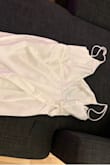 Very happy with the way this looks fits and feels. Soft and Silky without being too seethrough. I was surprised at the length and Im sure it would look better on someone who is taller than I am. Thank goodness for adjustable straps - Breanna W.
