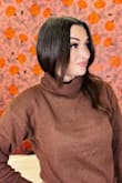 I love this sweater because it's the perfect weight. It's not too thick and not too thin. You can kind of tuck it in a bit if you want without it adding a bunch of bulk. It's also not so thin that you can see through it. It's very soft and super comfortable. I usually wear a small or medium and went with the medium so it would be a little oversized. Love it! - Sara R.