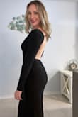 I bought this dress for a birthday ball and got so many compliments on it! It's nice and stretchy but the fabric is excellent quality. It accentuates your curves in all the right places. I did need to get it hemmed (I'm 5'4). - Emily S.