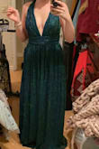 I liked it more than I expected to. The fabric is a beautiful blue/green shimmer and it looks so pretty on. The bust isn't super supportive so I'll probably add a little dress tape to feel secure dancing! - Riley M.