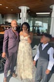The dress is gorgeous, but a little tight in the mid section. I received lots of compliments. - Latoya A.