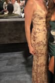 I had a black tie gala themed Guilded Glamour. For the price, the dress is fabulous! I did pay for expedited shipping and got here so quickly. Fit perfectly- I did not want a skin tight fit, instead wanted something I did not feel restricted in. If I wanted a tighter look probably could've sized to XS? The sequin/material on the outer layer is scratchy (to be expected) but the lining is soft and very comfortable! The dress moved easily, not heavy. I did not need to alter it at all! Wore no bra (or any coverage) and felt secured/no gapping. I am 5'7" and wore small heels (1.5-2" maybe?) and the dress length was great, if anything the under layer just a tad short but the outer was perfect. If you are a taller girl (5'7" and up) heels may be hard to wear length wise. Also a perk, the outer layer hid  any spilled drinks! - Lauren S.
