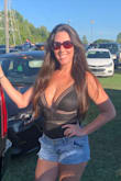 I am obsessed with this top!!!  I LOVE it and am going to buy the red one.  Medium was a tad tight but perfect since I went braless.  Wore it to an outdoor rock concert and I was getting more attention than the band! - Jillian S.