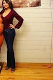 I have a very stick figure body with a big chest and I don't know how, but this fits every body type. It shows more of the bits than I'd like for work, but it's great quality and you can dress it up or down. There is a reason they sell out fast! - Amanda F.
