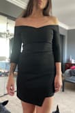 Very flattering dress and the stretchy material is comfortable. I usually wear a size medium but after reading other reviews about the tightness and length of the dress I decided to order a large. I'm happy with this size and plan to wear this to a winter wedding. My only complaint is I do wish the dress was a little longer. I can tell I will have to keep pulling it down during the wedding. - Amanda S.