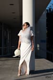 It was the perfect dress for me! The material used feels soft and I felt comfortable wearing it. We had our wedding at the courthouse grounds, and I was just looking for a simple yet elegant looking dress. Found it here and the price was decent! Loved it! Got a lot of compliments for the dress too - Jessica A.