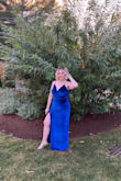 I ordered this dress in 2 sizes- the L and the XL for an evening wedding.  Both fit me, but I went with the XL because I wanted to have more room to enjoy the food and to still feel good in the dress since it had a form fitting shape. The chest of the dress was a little weirdly sewn, but it didn't detract from the dress for me. I honestly looked hott . If you want a hot girl dress that is still wedding-appropriate, this one is for you! It was giving old Hollywood in the best possible way. Also- FYI! The color was really more bright blue in the sunlight and dark blue in a dimmer light. - Amanda M.