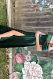 This dress was absolutely gorgeous on. Definitely take your measurements as the waist and bust are fitted. It came very wrinkled and the only way I could get the wrinkles out was by steamer- but that was the only problem I had! This dress is a 100000/10!!!! Wish I had more places to wear it - Brooke B.