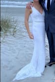 I absolutely loved this dress! Lulus really made the process of choosing the right dress a breeze. Easy return. This dress has a little bit of a pink hue when the sequins hit the light so it was perfect for a beach wedding. Reminded me of a sea shell. Prettier in person than online, in my opinion! I paired it with a belt from Lulu too! - Nancy J.