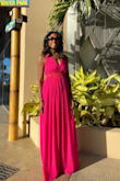 Fabulous dress! The material, texture and weight are extremely nice quality. The color  is riveting, making the dress a total standout. Love the feel and flow, Though a tad long, even with wedges (I'm 5.6). Absolutely worth a little hem. - Regina M.