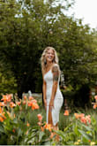 This dress was perfect for graduation pictures! The straps are adjustable and the material has some stretch. Plus, there's a lining so the dress isn't see thru! - Angelina B.
