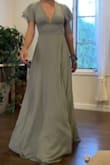 It fits perfect! I order I size S first, but had to return it cuz it is long. Preferably choose a smaller size. It's such a beautiful and elegant dress. - Ivana D.