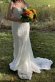 it came fitting well with no adjustments needed! the only thing I didn't love were the strings on the back which moved around a bit although I think I was the only one who really noticed. 
it was the perfect dress for our small ceremony :) - Natalie E.