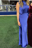 Normally I wear a size 4, Im 130 lbs, 34DD & 53. I didnt have to alter or hem the dress and it was an elegant choice for a gala. Got many compliments and would order it again.  The slit is on the side of the dress, not the front as it looks on the model. - Carmen B.