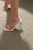 I wore these for my engagement photo shoot and I'm usually a size 7 in everything and these were HUGE on me! They were so big I couldn't even walk in them, let alone when I did try and walk in them they were so uncomfortable. Plus reviews are right they do make noise when you walk which is fine but I would save your money. - Kaitlyn M.