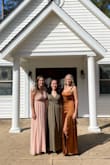 Loved this dress for my Moms wedding. A very pretty copper silk color, I'm usually a size 6 and the dress fit great. No stretch in the fabric around the ribs though. I found the tie-together straps to look a bit odd with the bows on top of my shoulders so I just tied them in the back, I'll probably get rid of the ties altogether and just sew the straps in for the next time. Definitely recommend! - Brindley F.