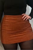 I am wearing this For my engagement photos, and I absolutely love this skirt! I have thick thighs and hips and the XL fit nice! I usually wear a 14 in pants. - Kendall V.