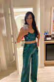 This outfit fit perfectly and was the right choice for a bir5thday celebration. VERY comfortable and easy to put on. Top is fully adjustable. Built-in bra pads make it even better, no messing with bras or pasties. The color is gorgeous and deep, like a peacock green. LOVE LOVE LOVE! - SMITA P.