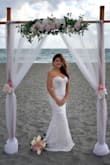 This dress was very beautiful and flattering! It fits like a glove and was very comfortable.  I received a lot of compliments and was very happy with my choice.  I wore the large and got it hemmed. - Patricia P.
