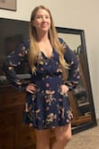 I bought this dress in two sizes Small and a Medium because my body type is kind of in between sizes. The medium fit ok but the sleeves on me were pretty baggy so I tried on the small and it fit much better in the arms. The small dress is a little shorter in length compared to the medium but the overall fit is great. The material is super soft too. Love it! Lots of compliments too! - Leah V.