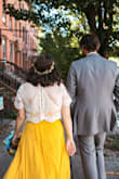 I wore this dress under a lace top for my wedding. I was 5 months pregnant at the time, so the dress was super bump-friendly. I got so many compliments on this dress!! - Nicole S.