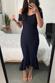 I normally wear black everything but decided to step out of my comfort zone and go with the navy on this one. So glad I did! This dress fit like a glove and was extremely flattering. Very comfortable too. Wore to a wedding and it traveled great. Received comments throughout the night and all over Facebook the next day. Everyone wanted to know where this dress came from! - Krystal C.
