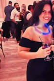 This dress was amazing! I wore it to a November wedding. I was debating between a large and a medium and wound up choosing the medium. It fit perfect and the length was just right. I am 5'6 and wore heels and the bottom of the dress still hit the floor and looked perfect. Stretchy material and very flattering! - Cheyenne F.