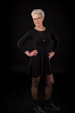 A lovely dress. It fits true to size. Very soft, lightweight material. Warm enough to wear on a cool fall day. - Dawn S.
