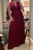 This dress was perfection in every way. It was comfy, versatile, and stunning. I wore it to a formal event and received many compliments. It didn't wrinkle and I loved all the different ways it would be worn. - Erin H.