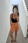 This body suit is nice, stretchy, and very flattering on the bust area.  Looks cute with shorts!  

Update: I wore it ONE time and wire poked through the material and it's ruined.  :( - Melissa L.