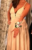 Dress fits like a glove and is beautiful. Wore this to a Prom themed birthday party and got so many compliments. The color is just as pictured. Theres no stretch to the fabric and at the end of the night the straps felt a bit tight. - Connie G.