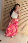 I loved the skirt. Pretty colors! I am usually a medium but I couldve definitely sized down. Luckily, you can tie the strings on the waist tight. - Tiyannah T.