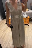 I ordered a jumpsuit and it is much too large to be a size small.. I also got stuck with $35.00 in duties for it to come to Canada. Then if I want to return it I would have to pay to ship it? Not even worth it. Super disappointed - Paige S.
