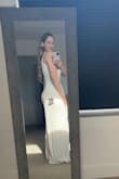 I wore this jumpsuit on my wedding day at the reception and I absolutely loved it. I did however get the length altered because it was extremely long. I also had the slit sewn slightly due to wearing shapewear. It is slightly see-through so I wore nipple covers and nude shapewear. After the changes it was perfect! - Shawnie J.