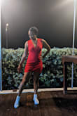 I had this dress originally in grey. I loved the deep cut and how awesome it made me feel even though I don't have alot of cleavage 

I got it in red because everyone should have a red dress 

It doesn't disappoint

Only thing that could make it better is pockets - Lani D.