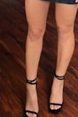 I love lace-up heels and was super excited for these. When I put them on, I found it was difficult to walk in the shoes. Since there is no heel to the shoe, the sole flip up (like a flip-flop) onto my foot. It helps to tie an X shape with the laces on the heel and then wrap to the front, but still not my personal favorite. Not a super sturdy shoe for wearing but it's very very cute. The shoes are also velvety and soft for a cute chic look. - Amanda T.