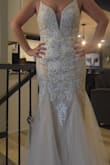 This dress was amazing. True to size. Fit perfectly. The straps were long but the dress completely surpassed my expectations - Rebecca R.