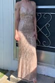 This dress makes me feel so powerful! It's tight I probably would have gotten a small just to compare but I wouldn't change it. - Michaela S.