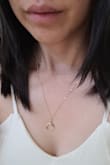It's been one of my favorite necklaces to wear so far, and I find it to be a good length. The chain did start to tarnish after wearing it so often, so that was a bit disappointing. Maybe I'll be buying another one because I love it so much. - Lauren Y.