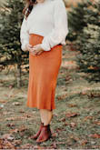 Wore this at 20 weeks pregnant for photos and it looked gorgeous. Planning to wear it again for thanksgiving! Stretchy to wear during pregnancy or not. - Cayla M.