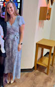 I received many compliments on this dress! It fit great except it showed way too much cleavage. I brought it to the cleaners to sew the chest area so the picture I uploaded is with it altered a little! - Regann M.