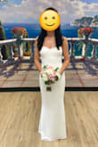 I am in love with this dress. It is a perfect courthouse/ small wedding dress.
It is an amazing dress and good quality.
It has two layers of fabric and built in cup. I had to take half inch off of the hem because even with 4" hells it was a little too long. (I am 5'3"). - Angelita S.