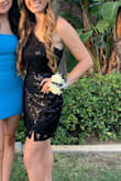 I was to wear this at hoco and it fit well but I has to pin it in the back. it runs a little big but I would size down! - Tate L.
