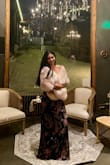I wore this to a November wedding and it kept me wonderfully warm. I loved the elegant look on me. My only wish is that it had a built-in clasp so I didn't have to hold it around me all night. My mother-in-law had a similar shawl but it had a clasp - Nohemi L.
