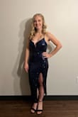 Dress is a lot more navy than it appears in the pictures. The XS hit 4-6inches above my ankle and I'm 5 feet tall, but I thought it still was super cute. Loved the leg slit. I did find the dress to be a little unforgiving to the midsection. Otherwise was very comfortable and easy to dance in! - Dana A.