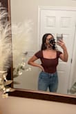 This could not be more perfect and flattering for a short curvy body I felt so snatched. I didn't even need a bra and my boobs NEVER look good in shirts without a bra. Wish there were more colors. And the color and style is so trendy and goes with literally anything. - Sondae M.