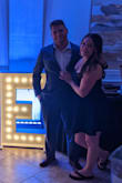 I read the reviews and couldn't agree more that this dress is absolutely flattering. It hides love handles/middle section area perfectly which I needed. The chest is a little tighter and you can easily wear a regular bra or even just pasties since it is supportive. I ordered a medium on purpose and it fit great! - Katie T.